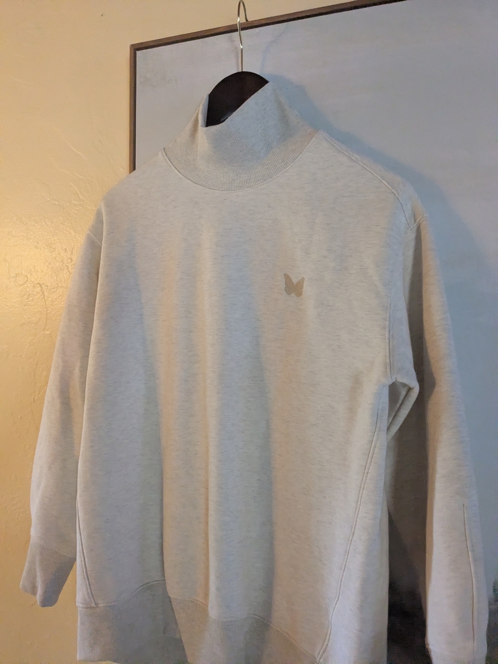 Everlane Mock Neck Sweater with Subtle Butterfly Logo